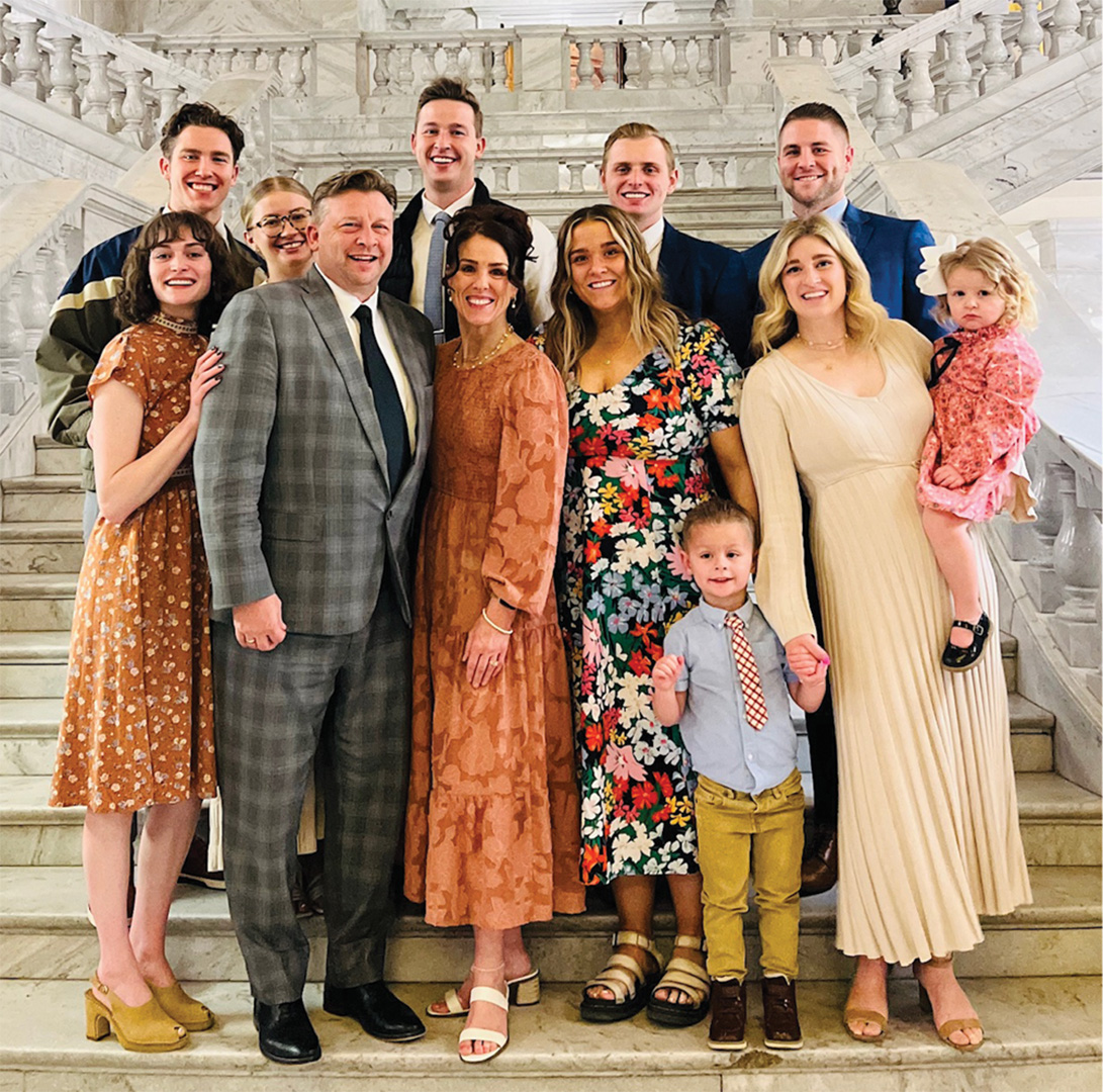 Senator Todd Weiler smiling with his family